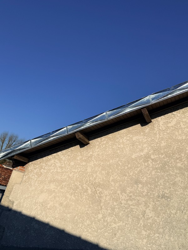 rive de bandeaux en zinc pointe de diamant 