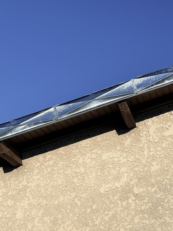 rive de bandeaux en zinc pointe de diamant 