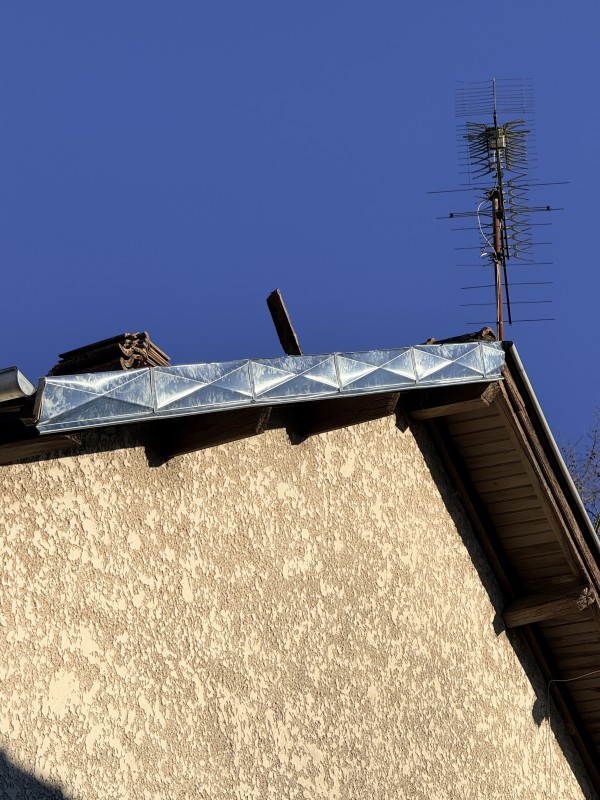 rive de bandeaux en zinc pointe de diamant 