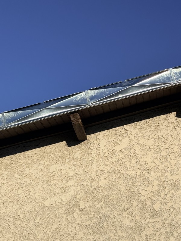 rive de bandeaux en zinc pointe de diamant 